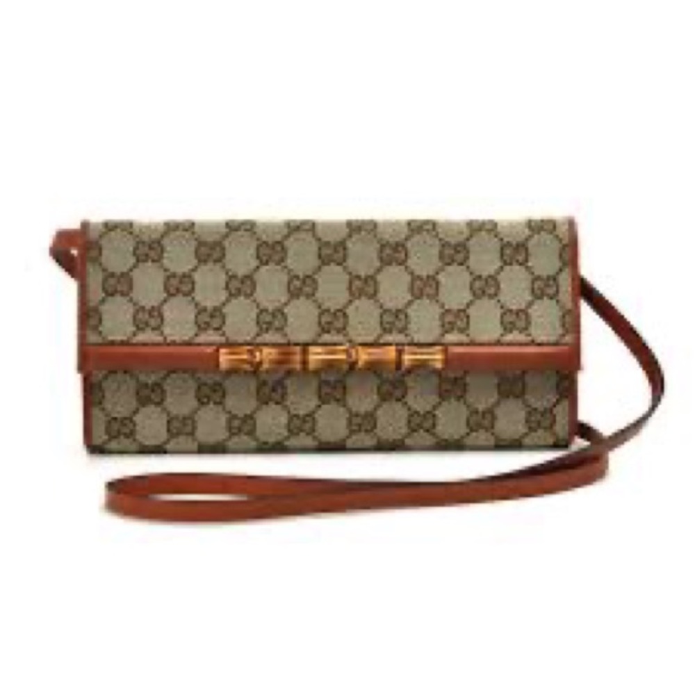 Authentic red trim bamboo clutch from Gucci